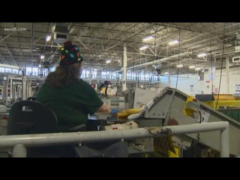 Inside the USPS distribution center on one of its busiest days