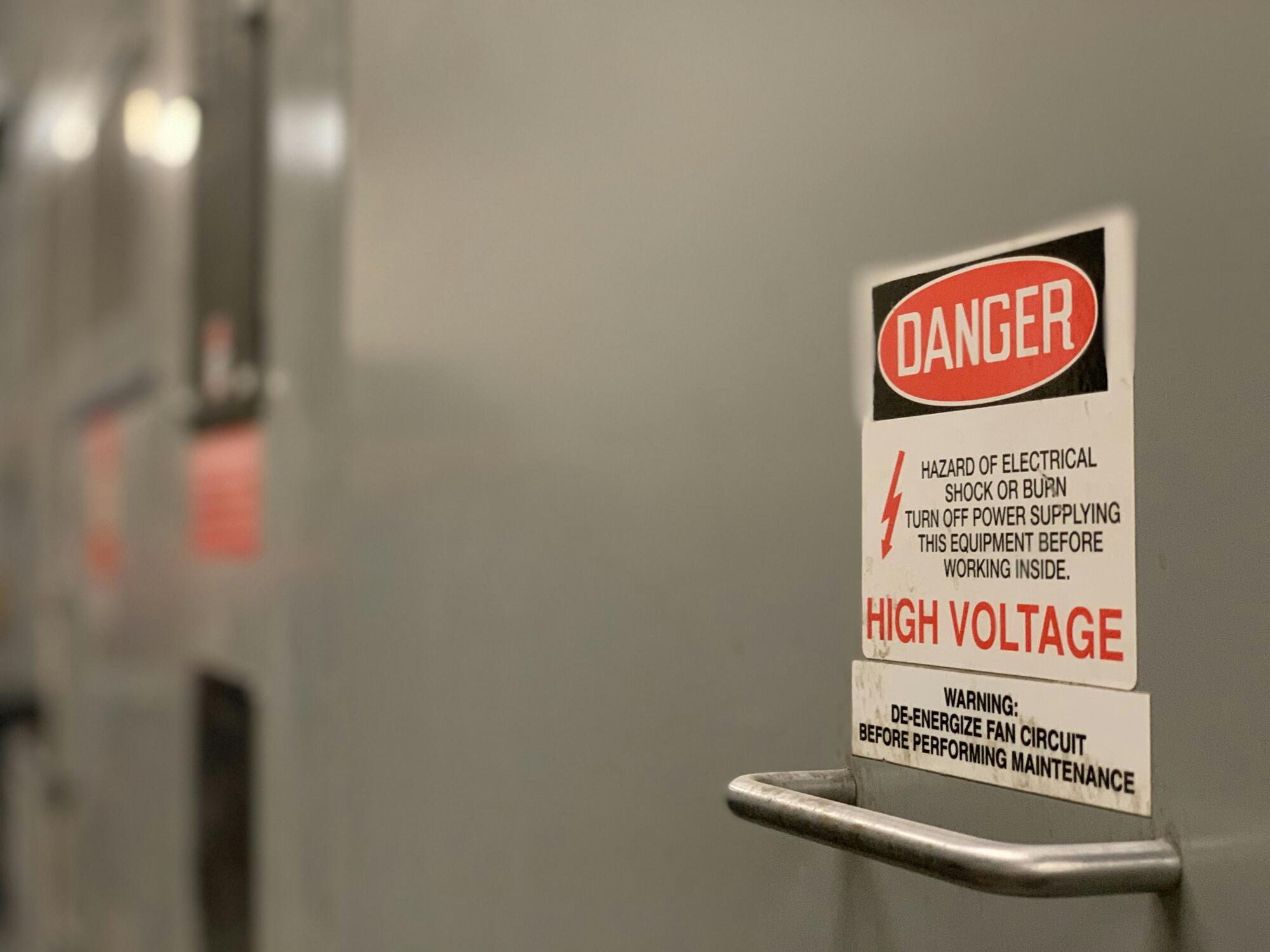 Danger High Voltage Sign on El