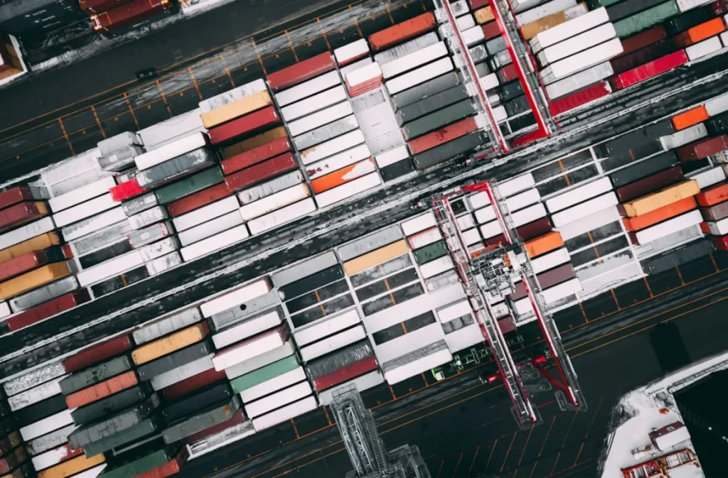 Aerial view of hydrogen cargo containers in a logistics yard.